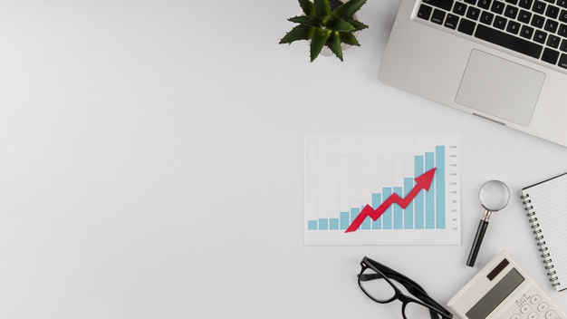 top-view-office-desk-with-growth-chart-copy-space_23-2148780606